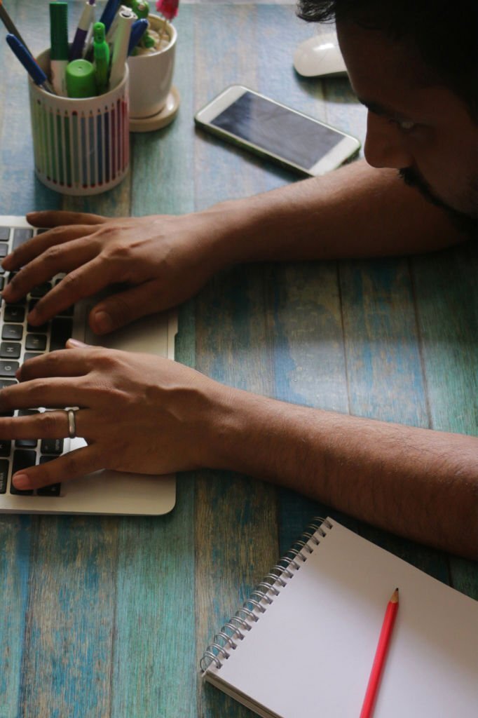 Men Working On A Laptop